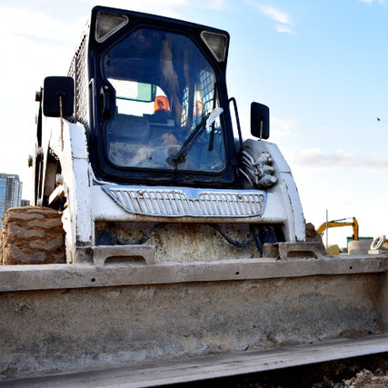 Earth MovingA close-up of a parked skid steer.